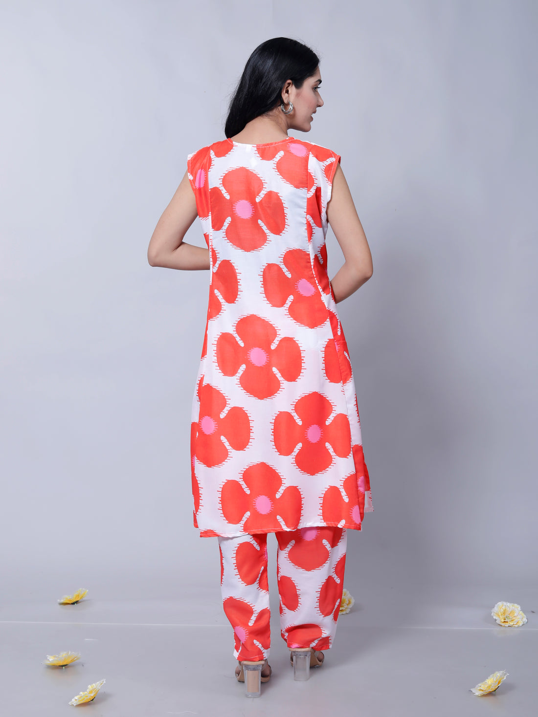 Front view of the red floral printed muslin cotton kurta, featuring a vibrant floral pattern and relaxed fit, perfect for stylish occasions.