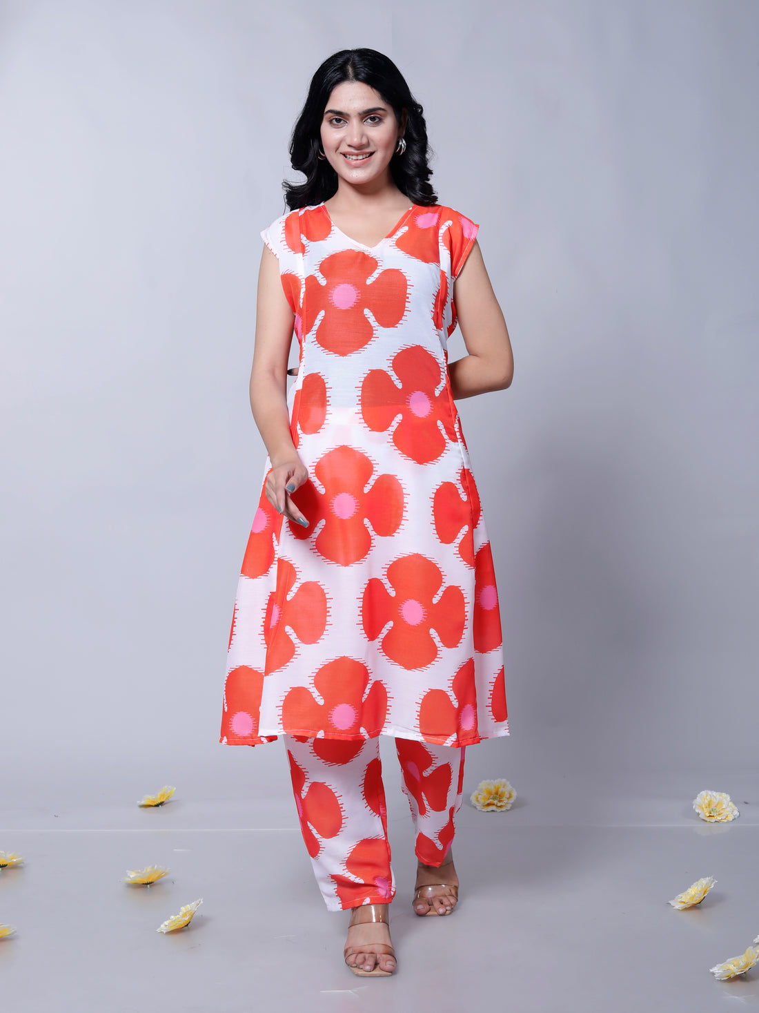 Front view of the red floral printed muslin cotton kurta, featuring a vibrant floral pattern and relaxed fit, perfect for stylish occasions.